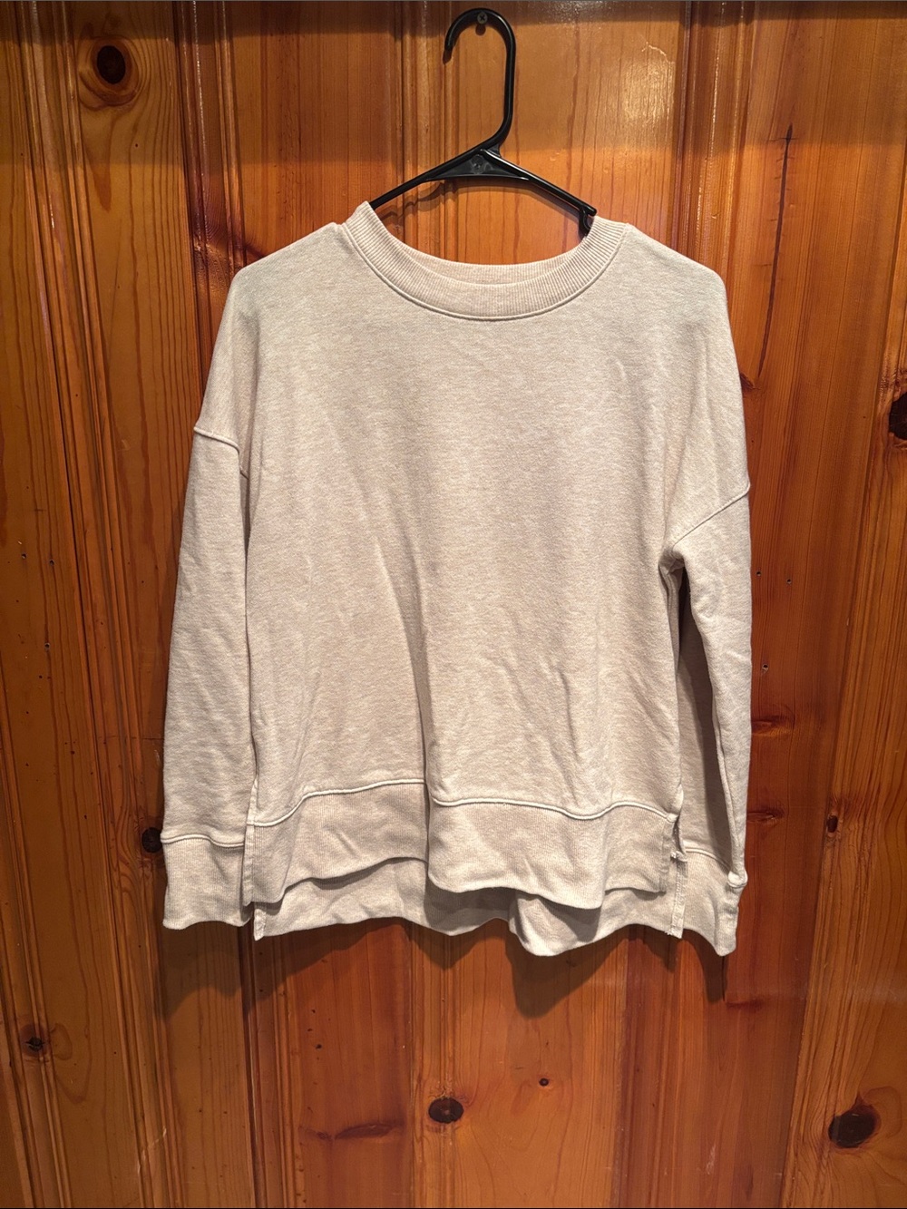 Cream crewneck sweatshirt